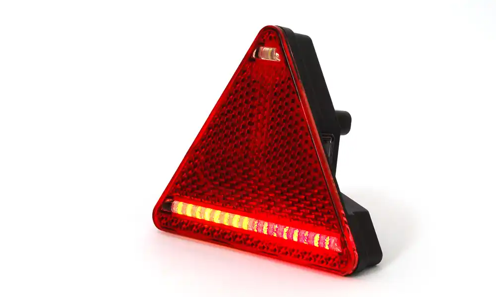 Tylna lampa zespolona (Trójkąt) Pozycja/Stop/Kierunkowskaz/Odblask/Oświetlenie tablicy rejestracyjnej (Lewa) 12/24V W68L Nowy